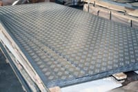 Лист стальной рифленый